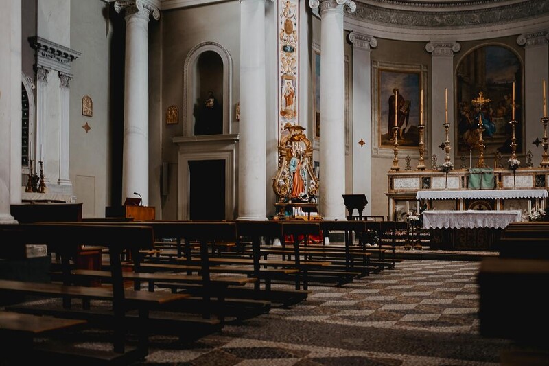 Catholic church with pews and saints