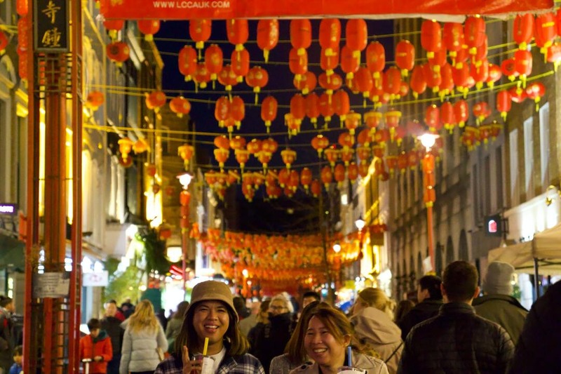 tourists in a chinese bazaar