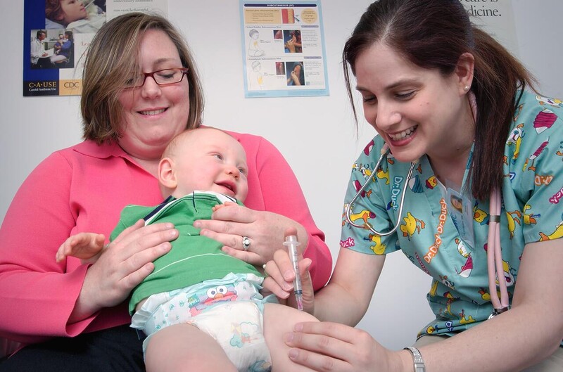 pediatrician with baby