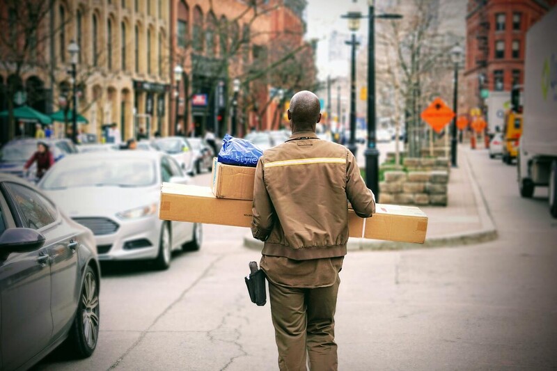 Delivery man delivering boxes