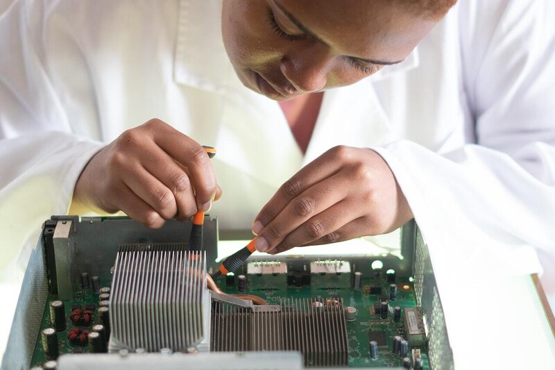Technician repairing computer